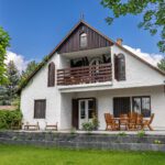 Waterfront holiday lodge with large garden abroad in Hungary. Family-friendly and baby-friendly